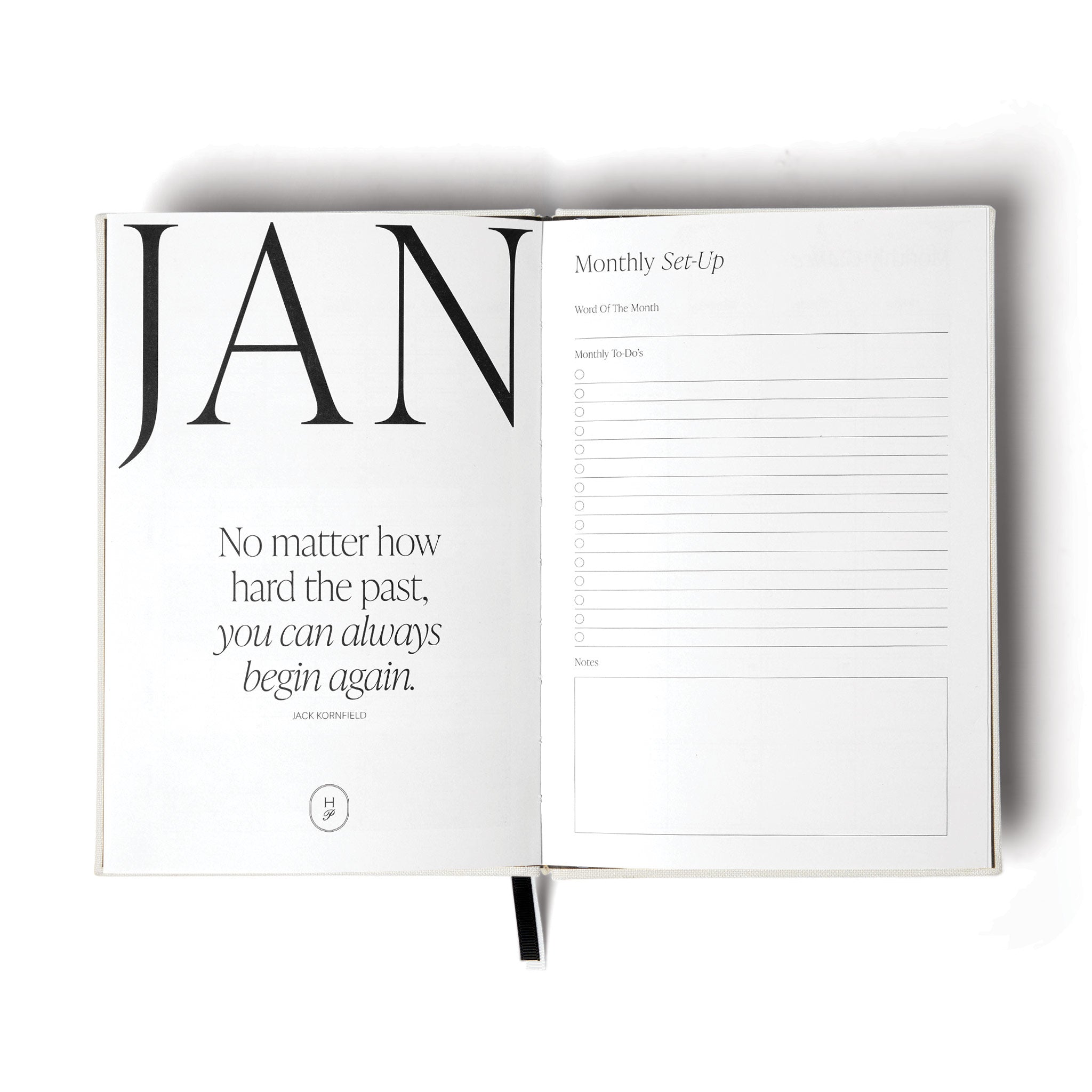 The 2026 Diary by The Head Plan in the colour White open to 'January Monthly Set-Up' and a motivational quote #color_white
