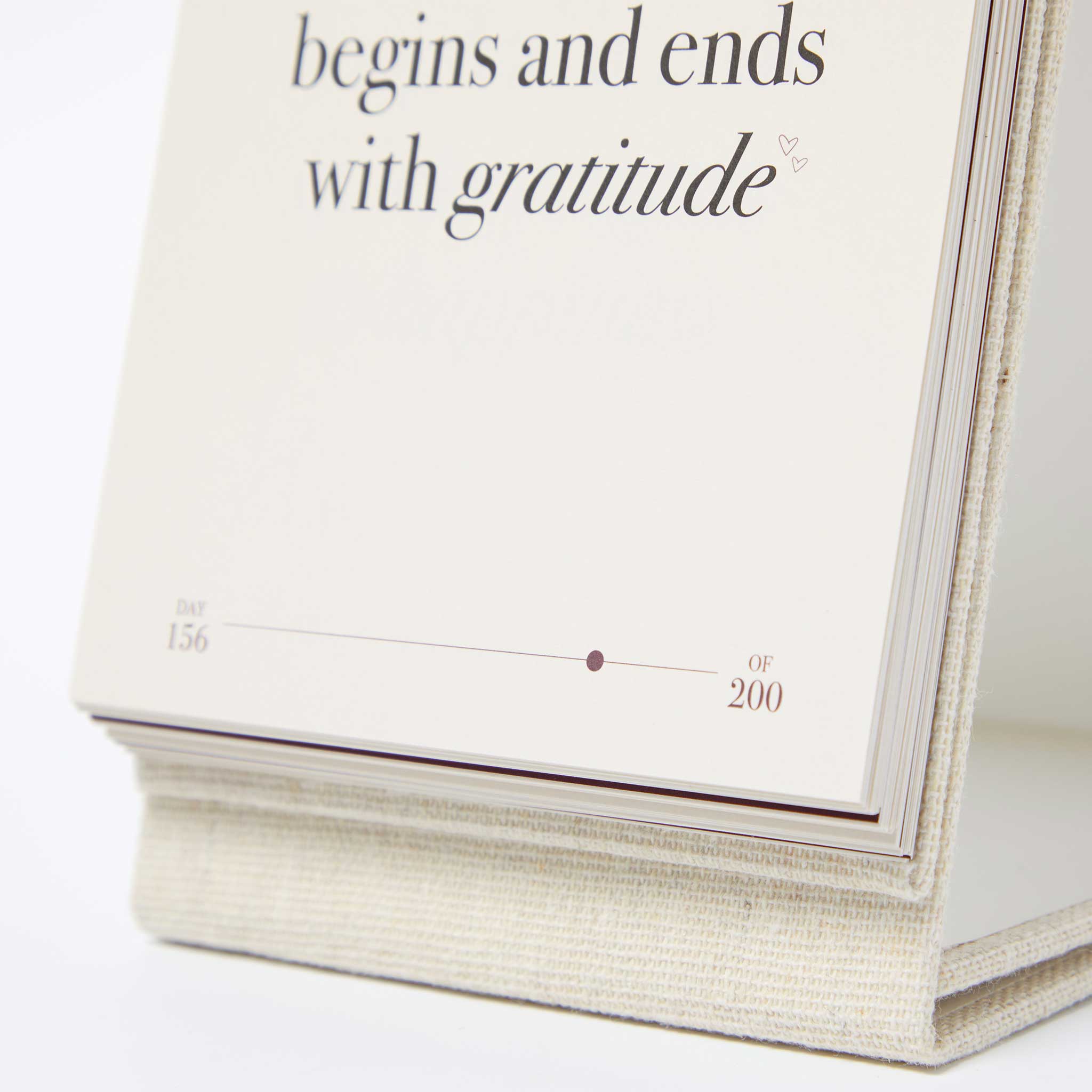 Detailed close-up of the affirmation flip deck