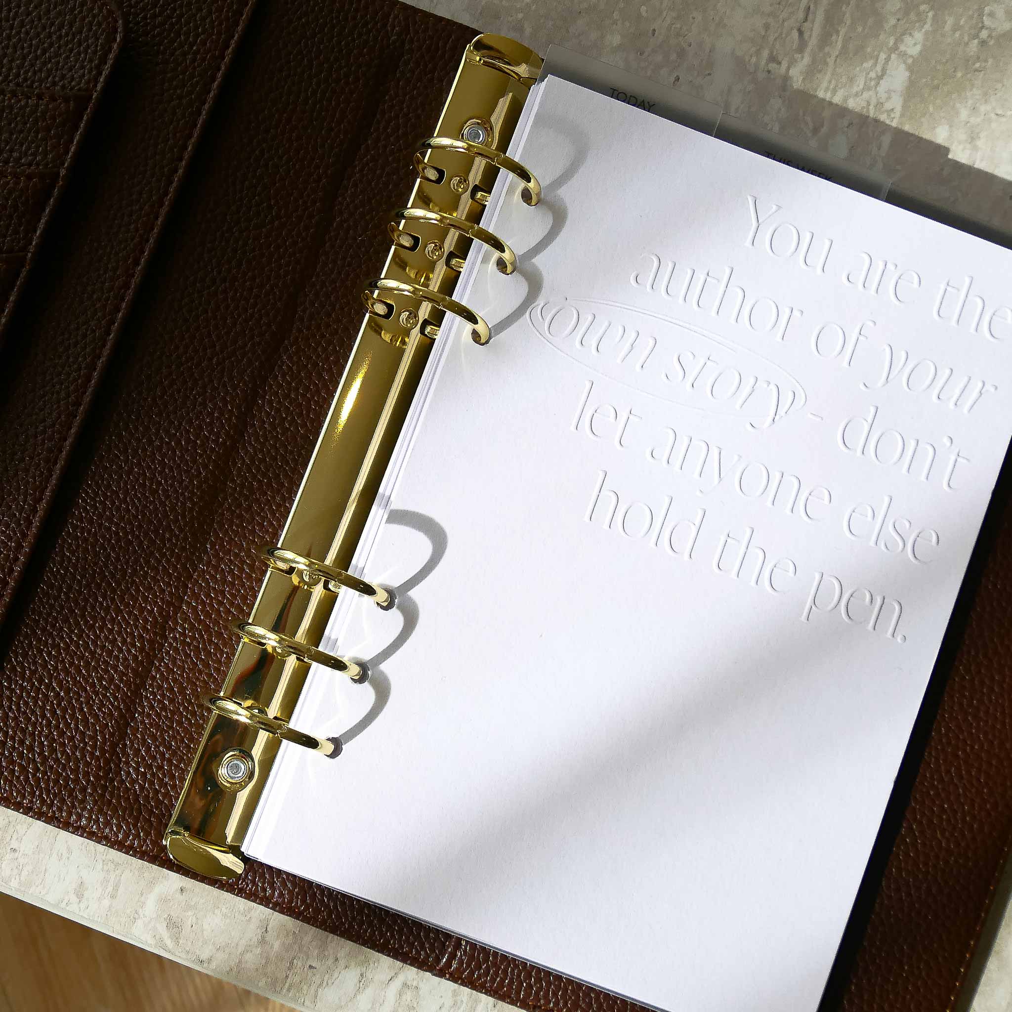 Lifestyle image of The Head Plan A5 espresso vegan leather ring binder Agenda open #color_espresso