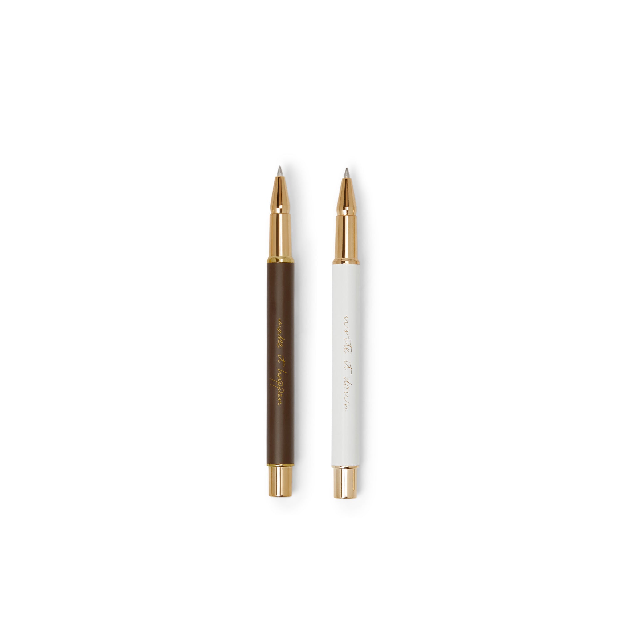The Head Plan Pen Set: white and espresso ballpoint pens with gold accents without lids side by side on white background