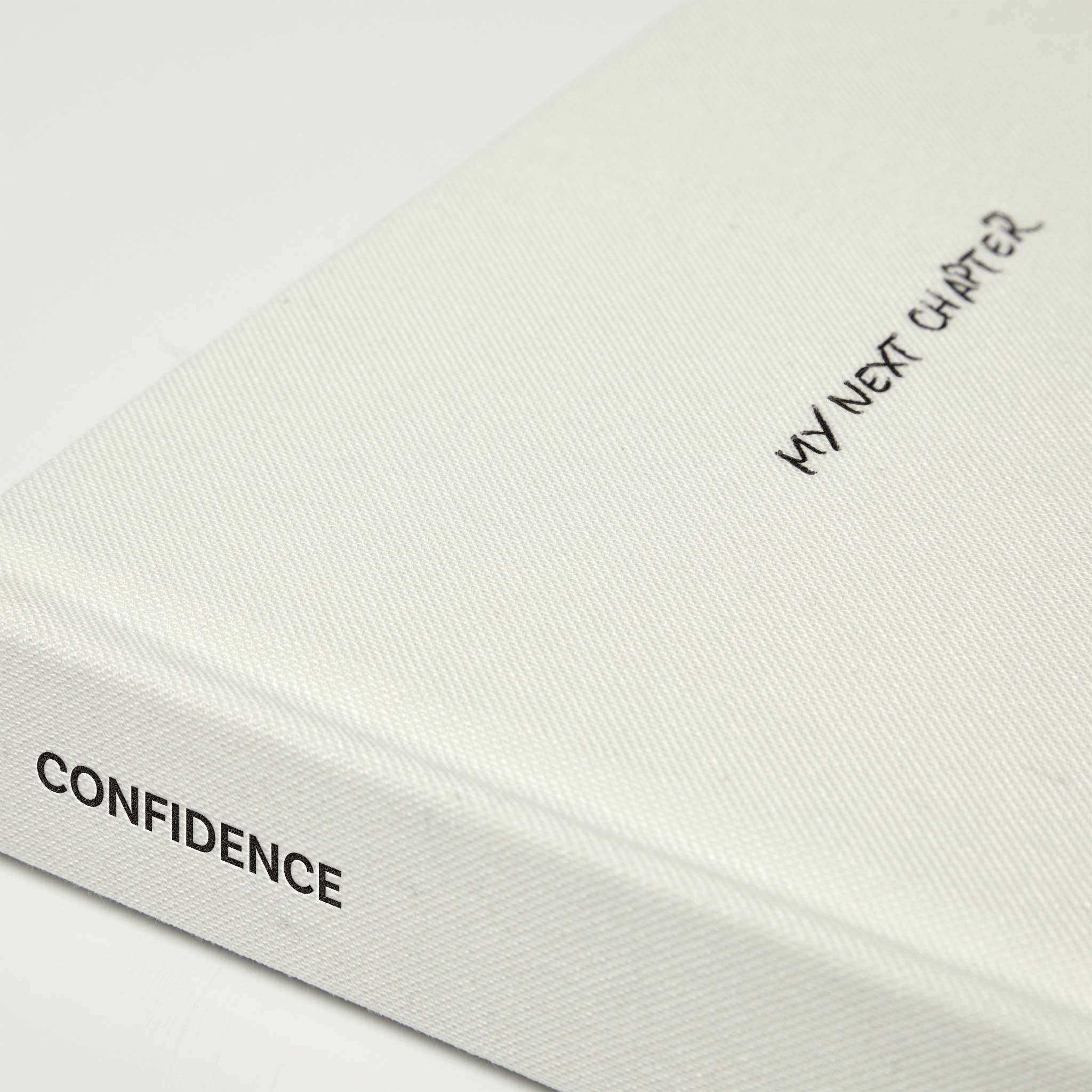 Close up of the journal by Roxie Nafousi in Collaboration with the Head Plan showing the spine and cover