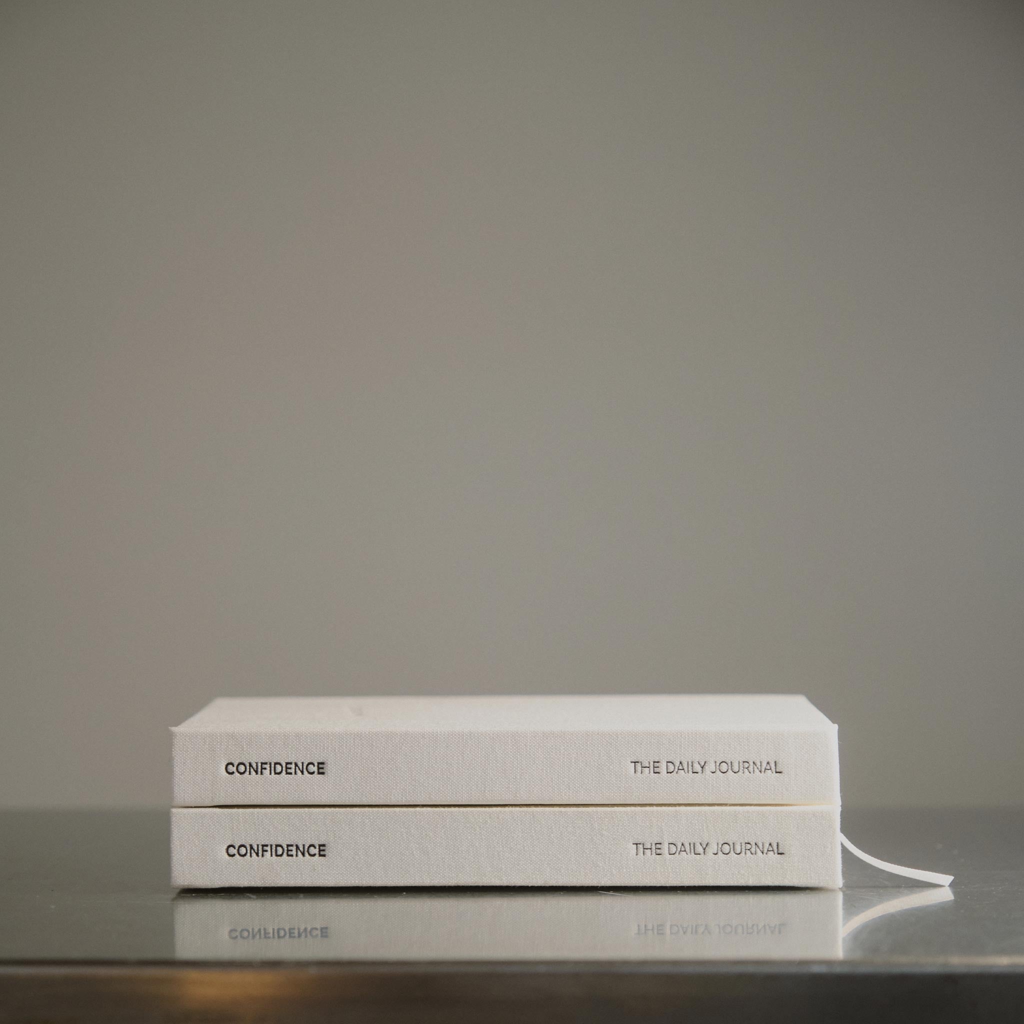 Lifestyle image of of the spine of the Journal by Roxie Nafousi in collaboration with The Head Plan 